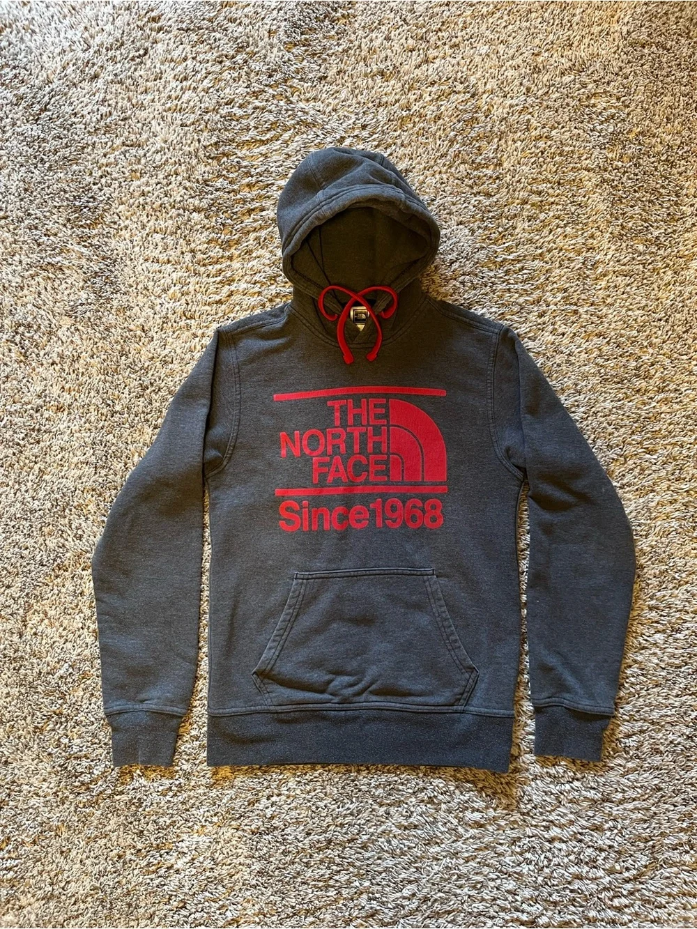 The North Face Men’s Charcoal Hoodie with Red Logo and Red Drawstrings